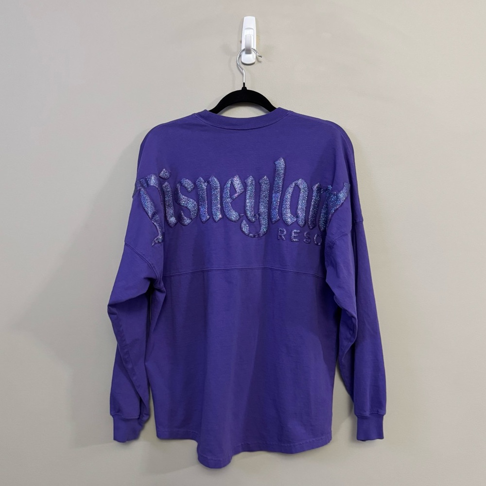 Disneyland resorts parks Spirit jersey purple glitter spell out long sleeve top
